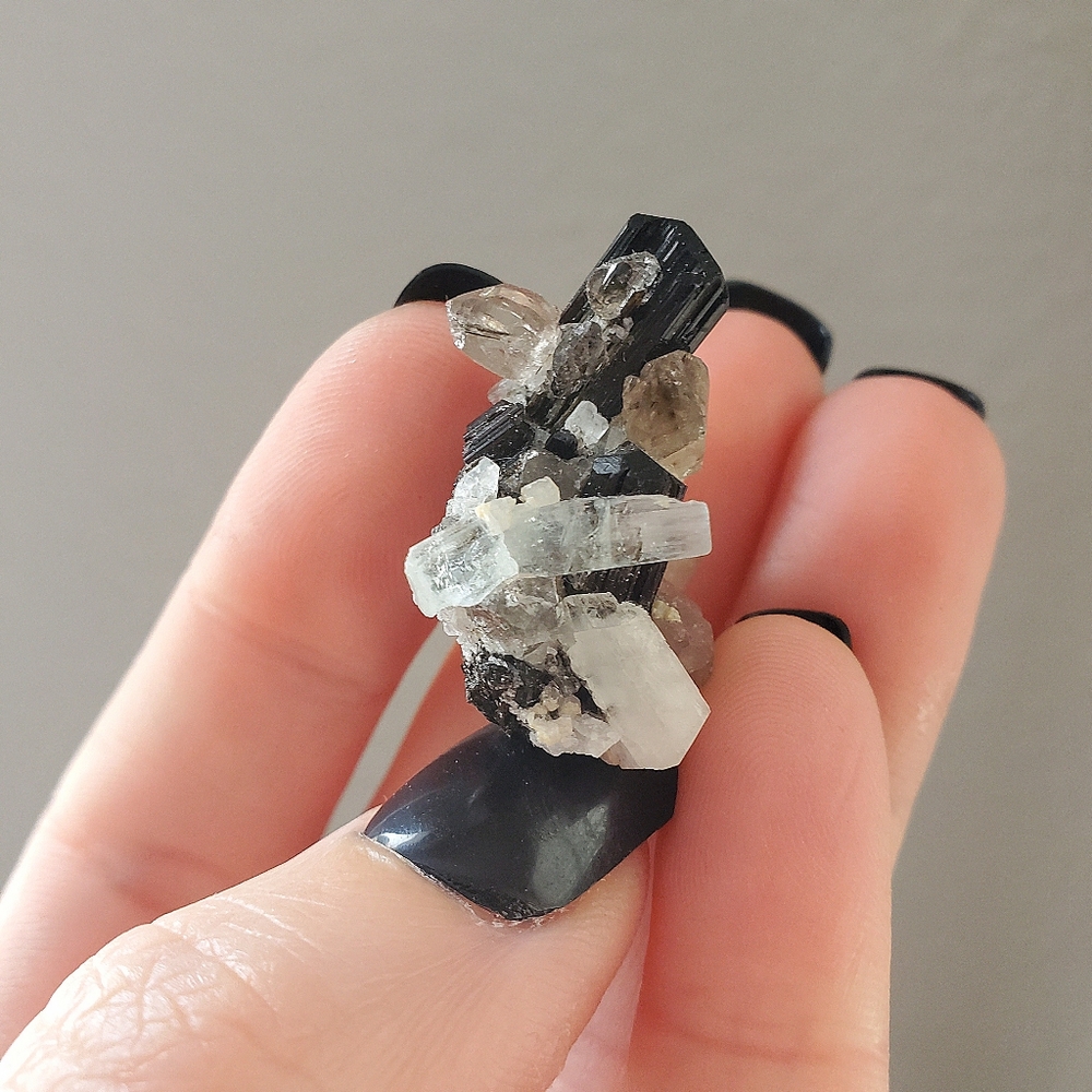Aquamarine black tourmaline and smoky quartz crystal specimen